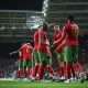 L'équipe du Portugal célébrant son troisième but.